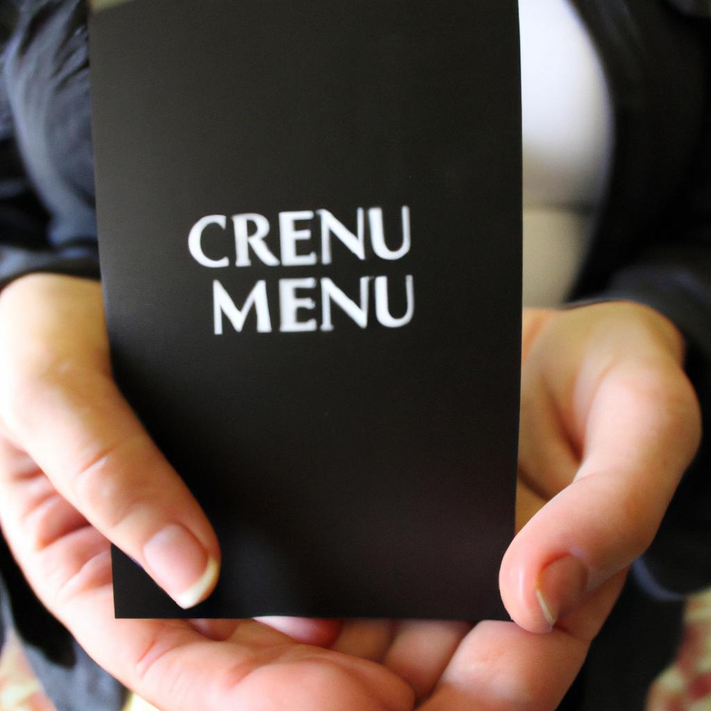 Person holding a menu card